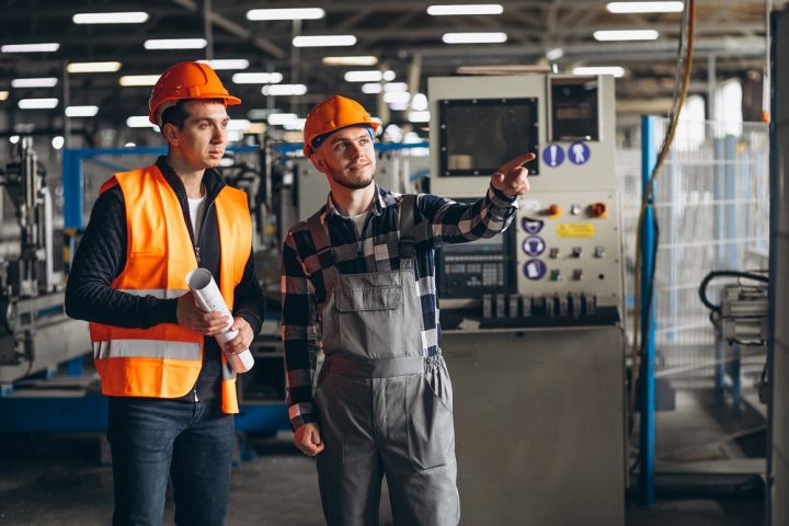 Two colleagues at a factory