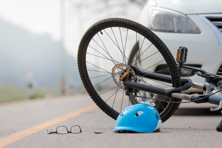 Accident car crash with bicycle on road