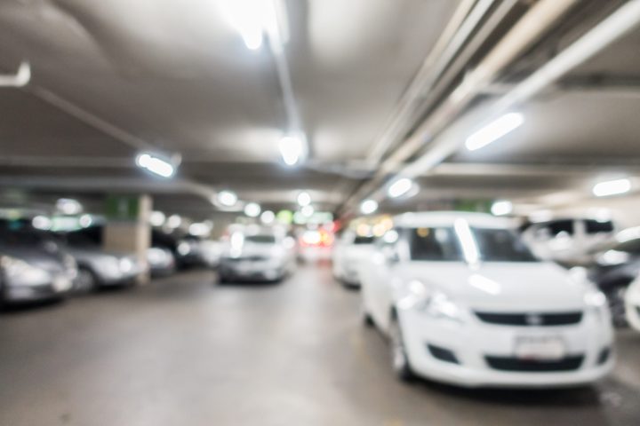 Abstract blur car parking lot interior for background