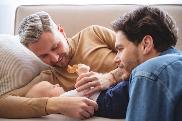 close-up-two-dads-baby