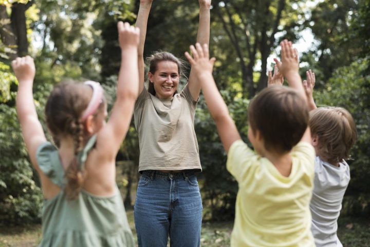 teacher-kids-exercising-outdoors